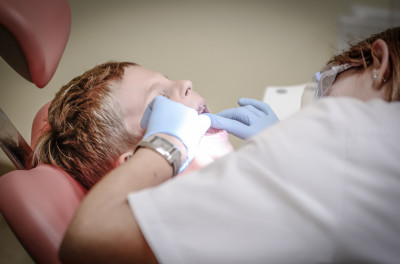 Child receiving orthodontic treatment